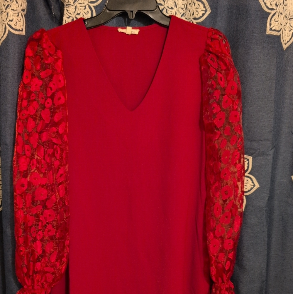 Elegant Red Dress with Lace Sleeves.